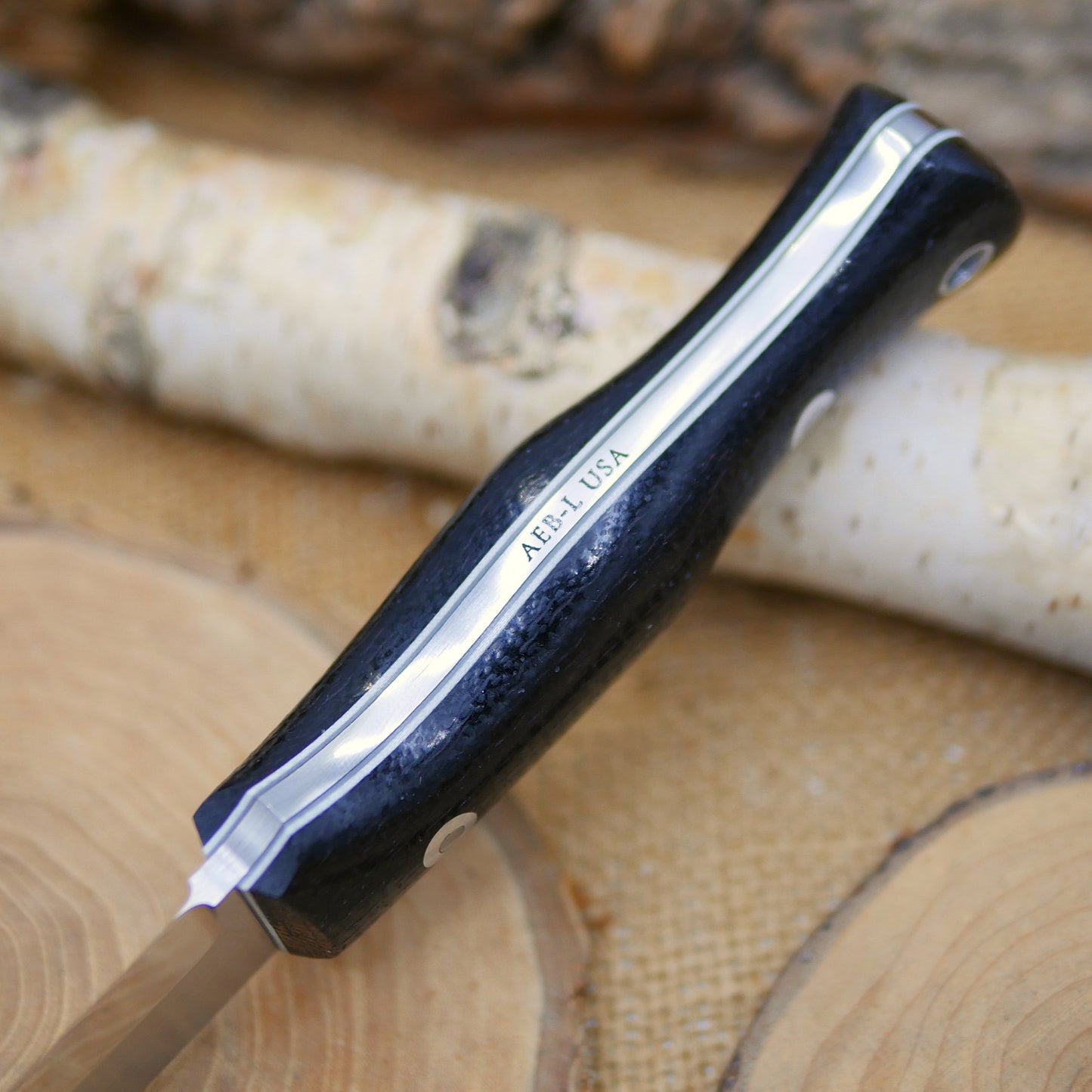 Explorer: Black Burlap Micarta, White & Grey Liners