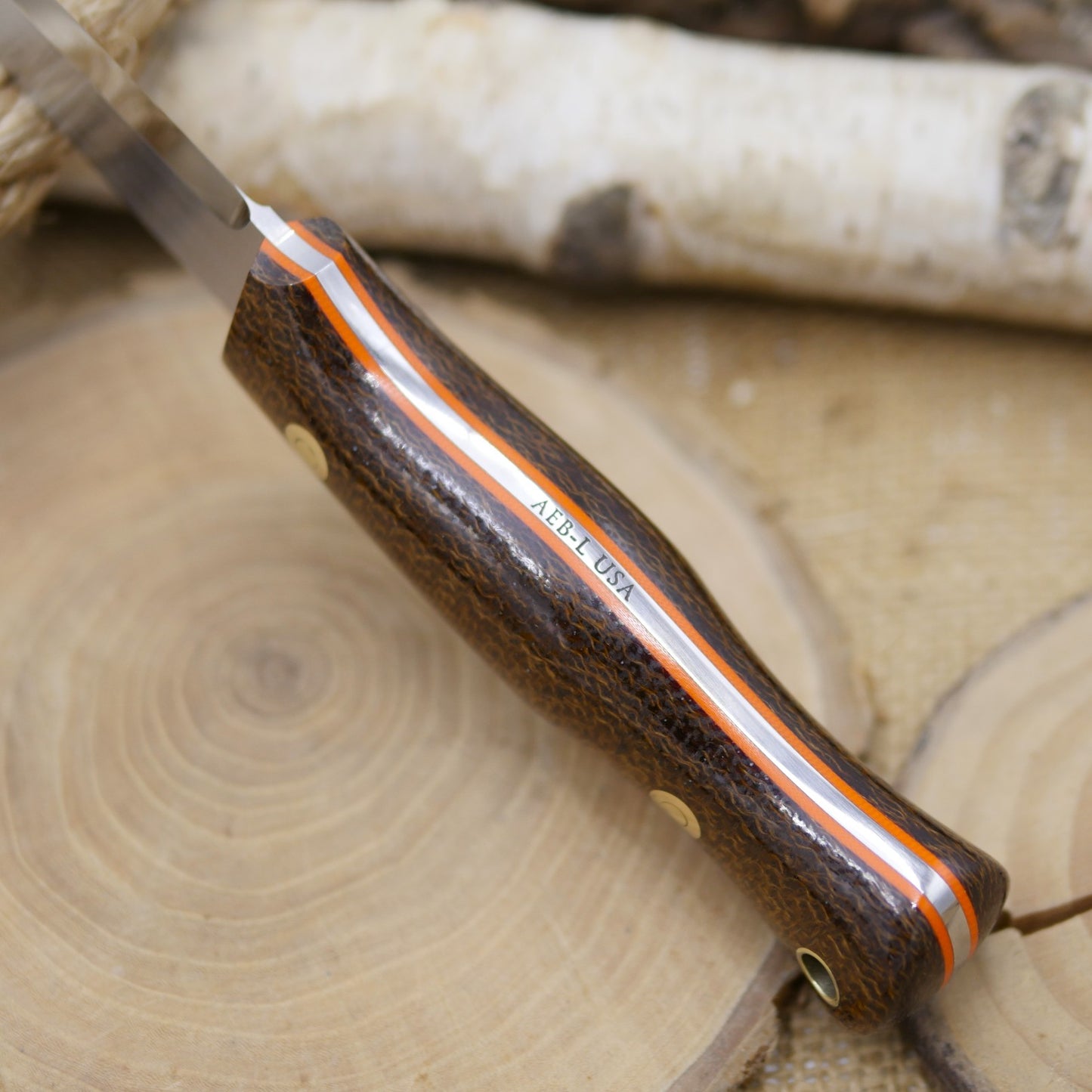 Mountaineer: Dark Brown Burlap Micarta, Orange G10 Liners