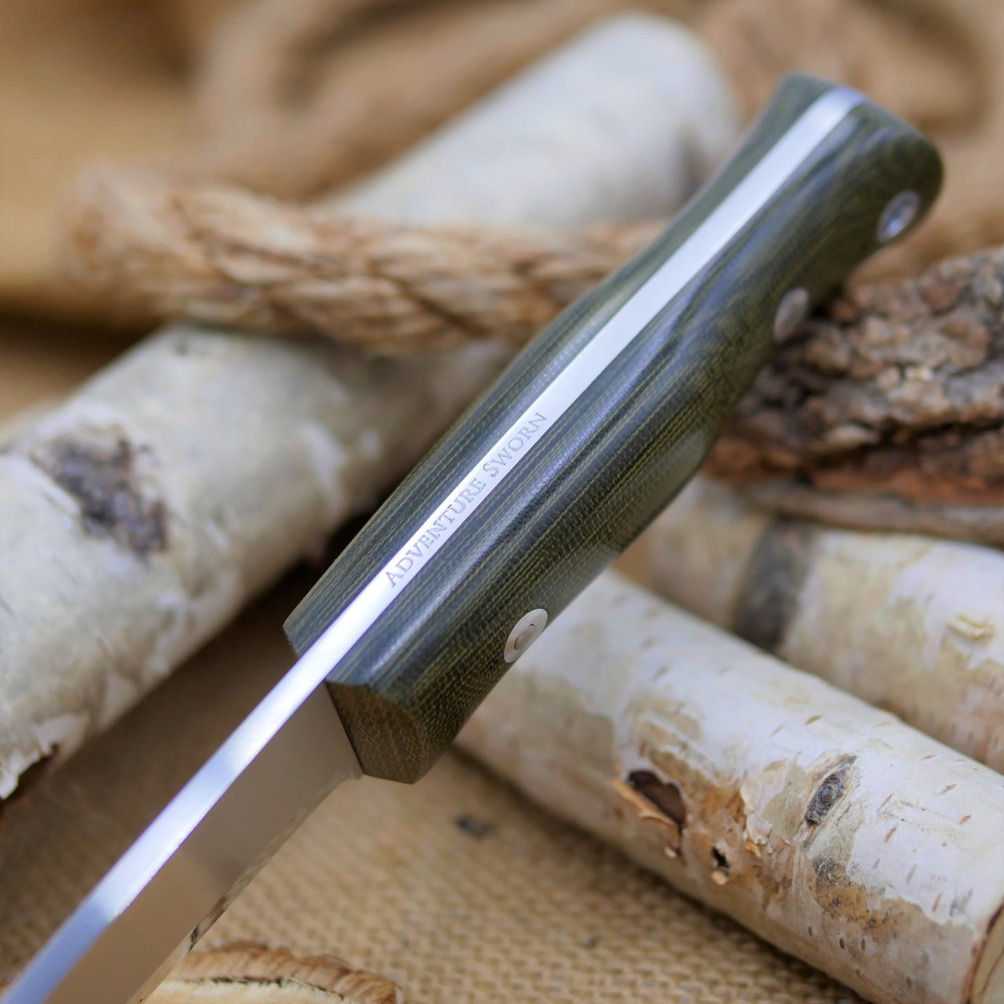 Classic: AEB-L steel, Green Canvas Micarta