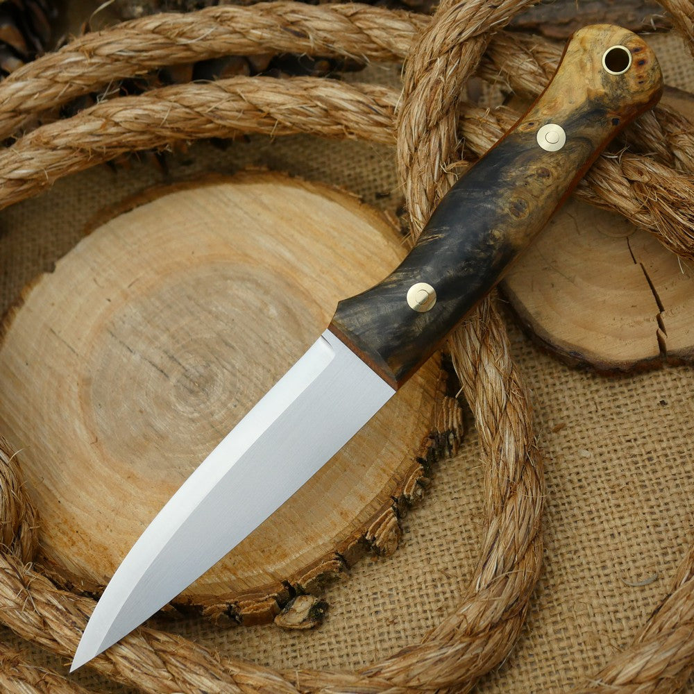 An Adventure Sworn Mountaineer bushcraft knife with Ohio buckeye burl handle scales and brown canvas liners.