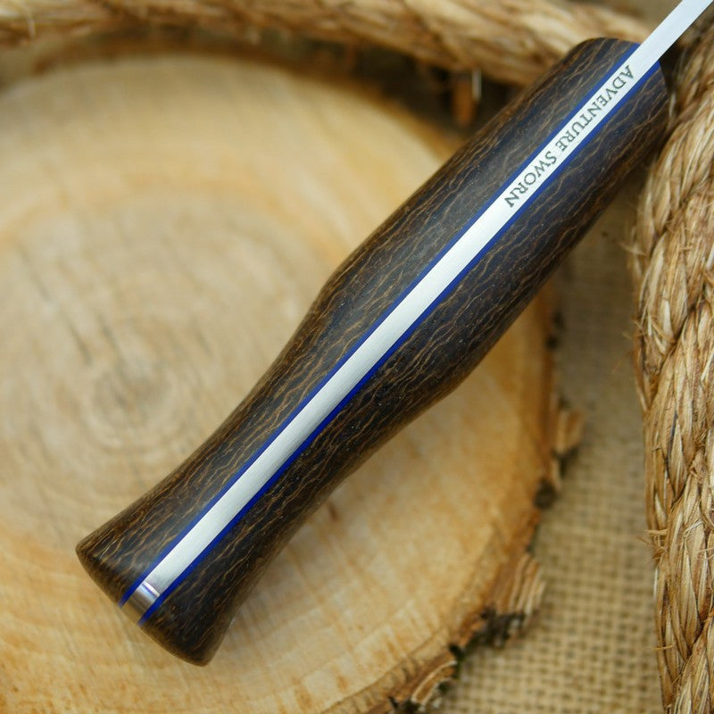 An Adventure Sworn Mountaineer with coffee bag burlap handle scales and thin blue liners