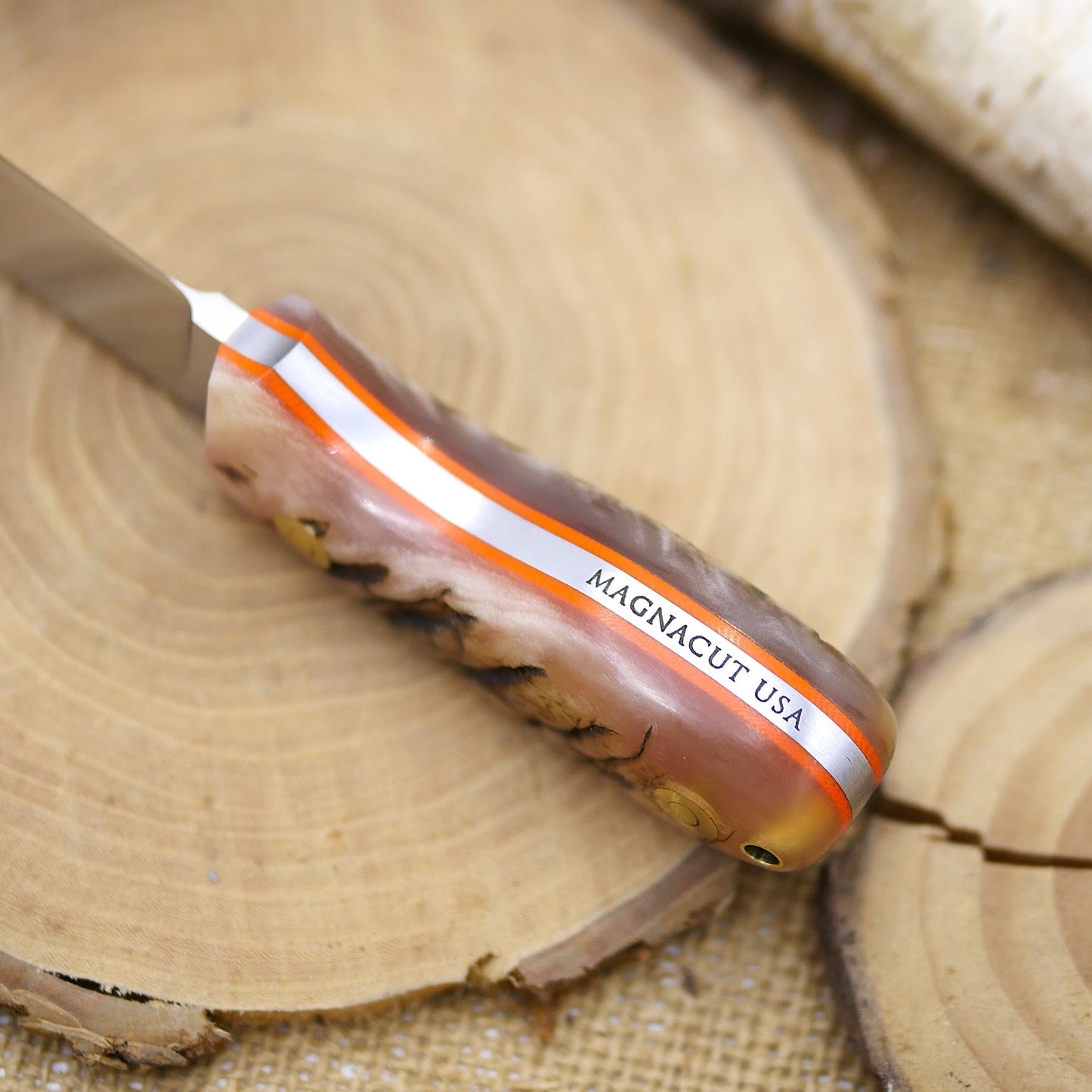 Nomad: Ram's Horn & Orange G10