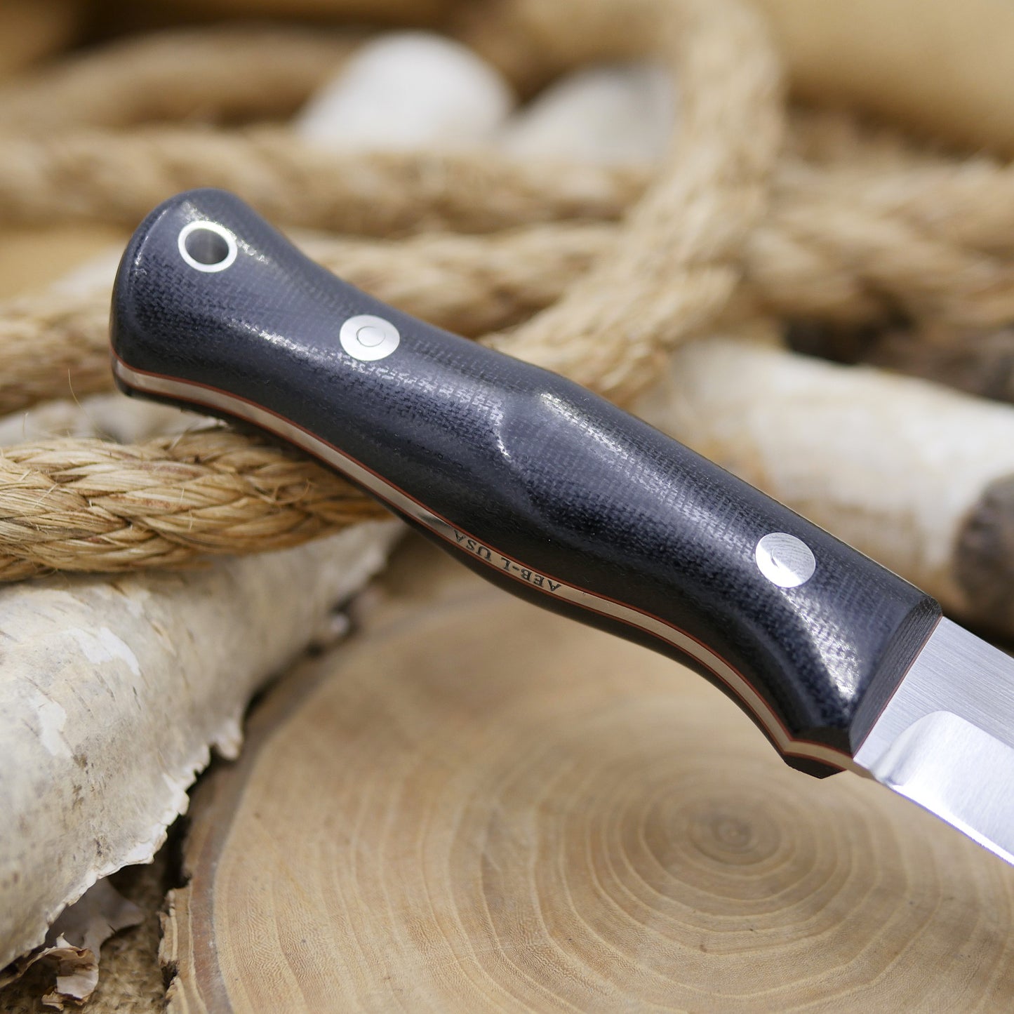 Explorer: Black Canvas Micarta & Cinnamon Red Liners