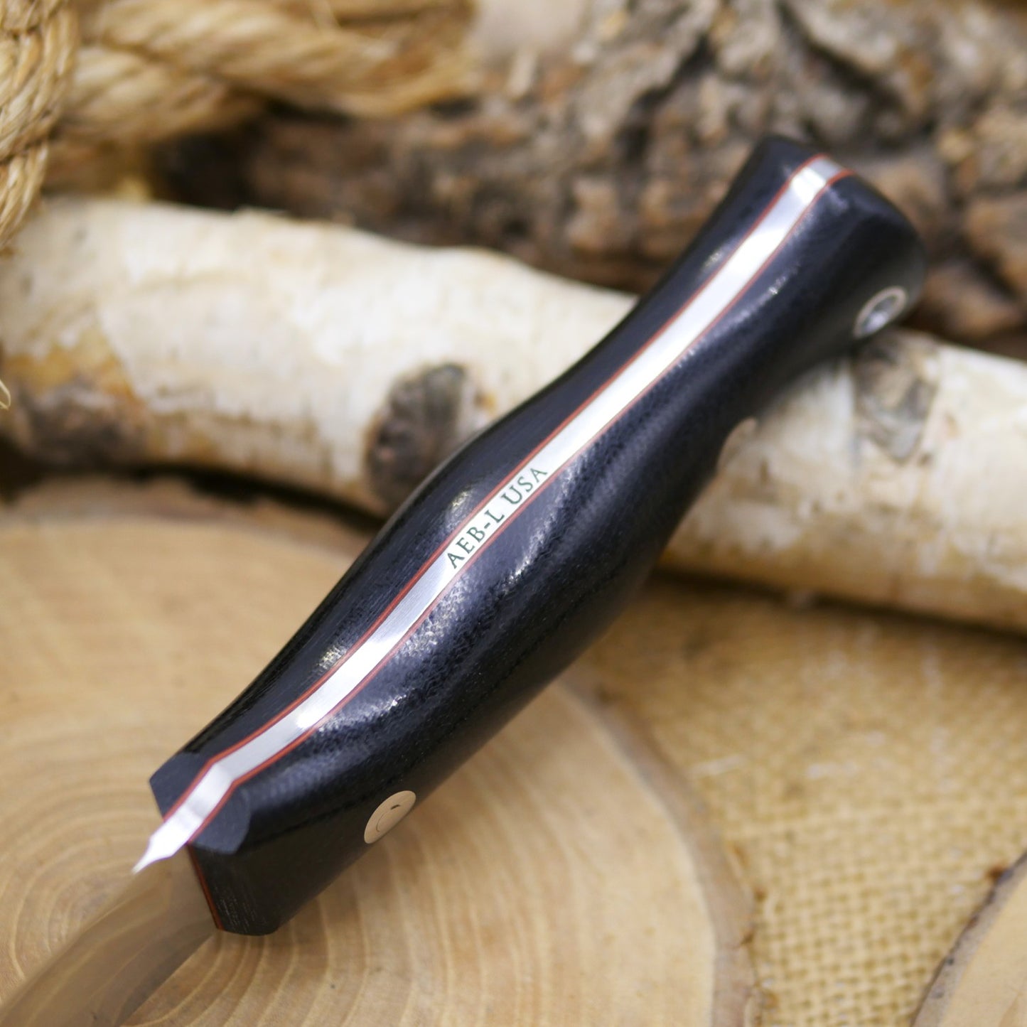 Explorer: Black Canvas Micarta & Cinnamon Red Liners