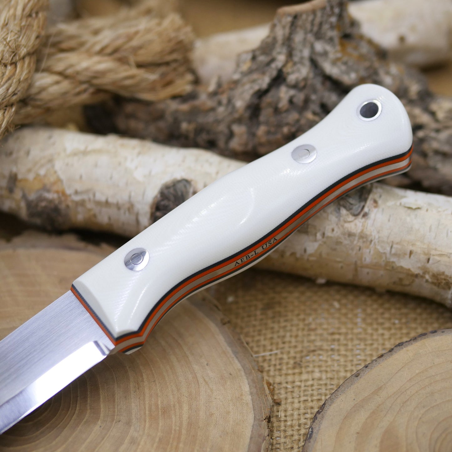 Mountaineer: White G10, Orange & Forest Green Liners