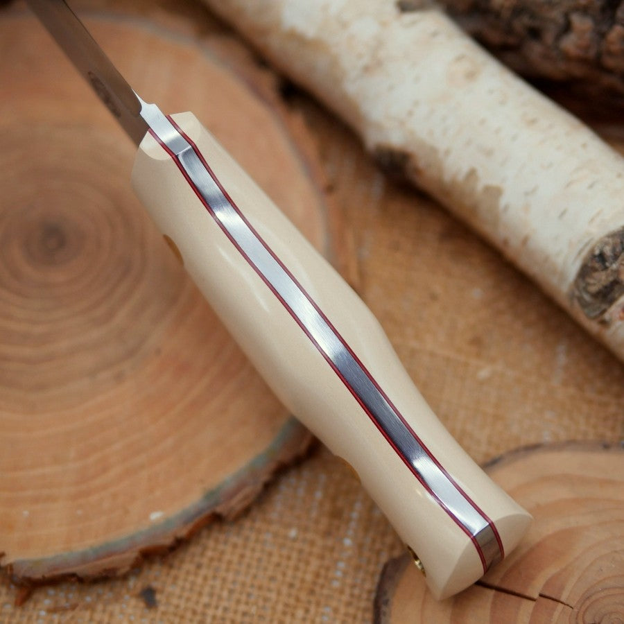 Classic: Ivory Paper Micarta, Cinnamon Liners