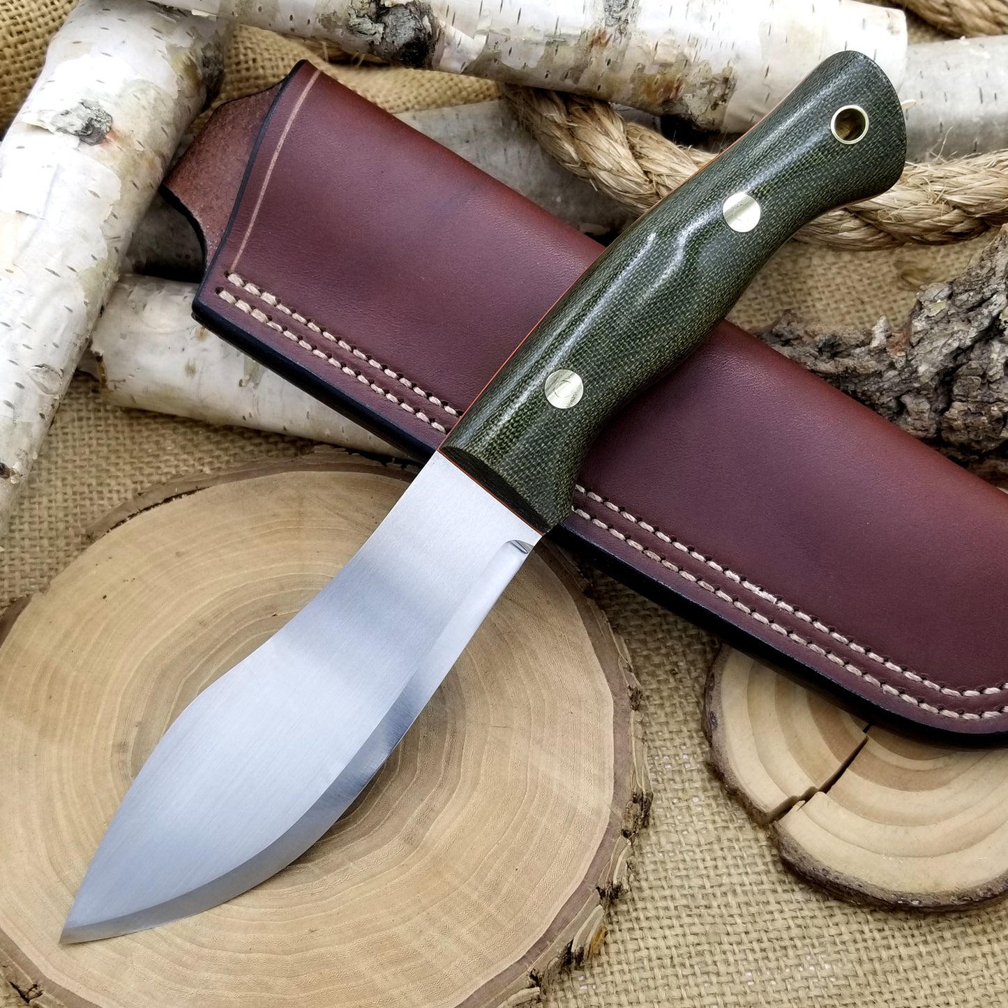 Guide: green canvas micarta & orange g10