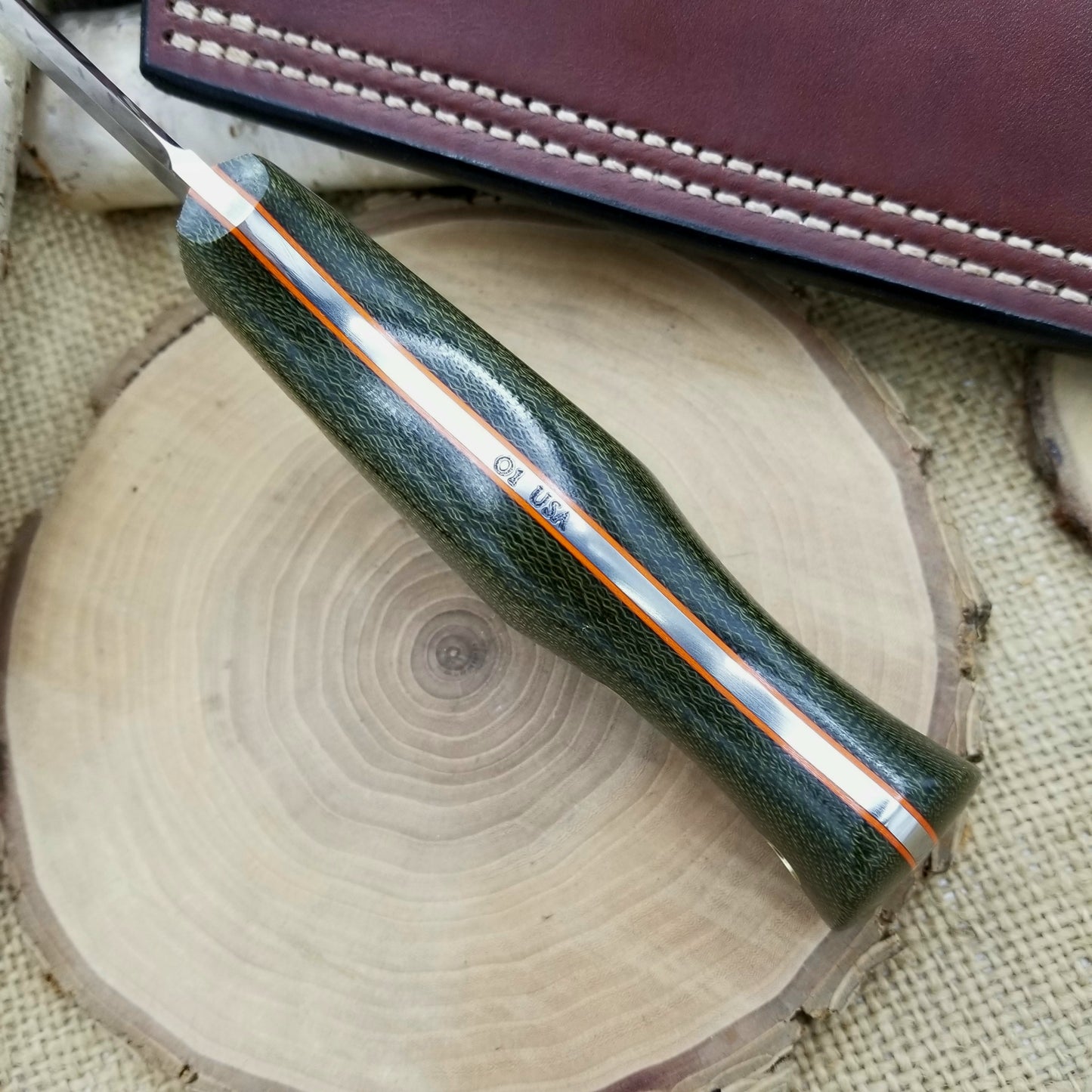 Guide: green canvas micarta & orange g10
