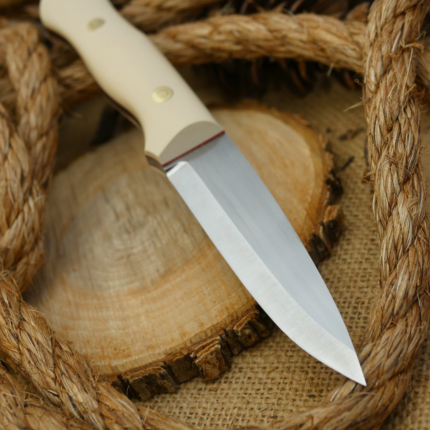 An Adventure Sworn Mountaineer with ivory paper handle scales and cinnamon red liners