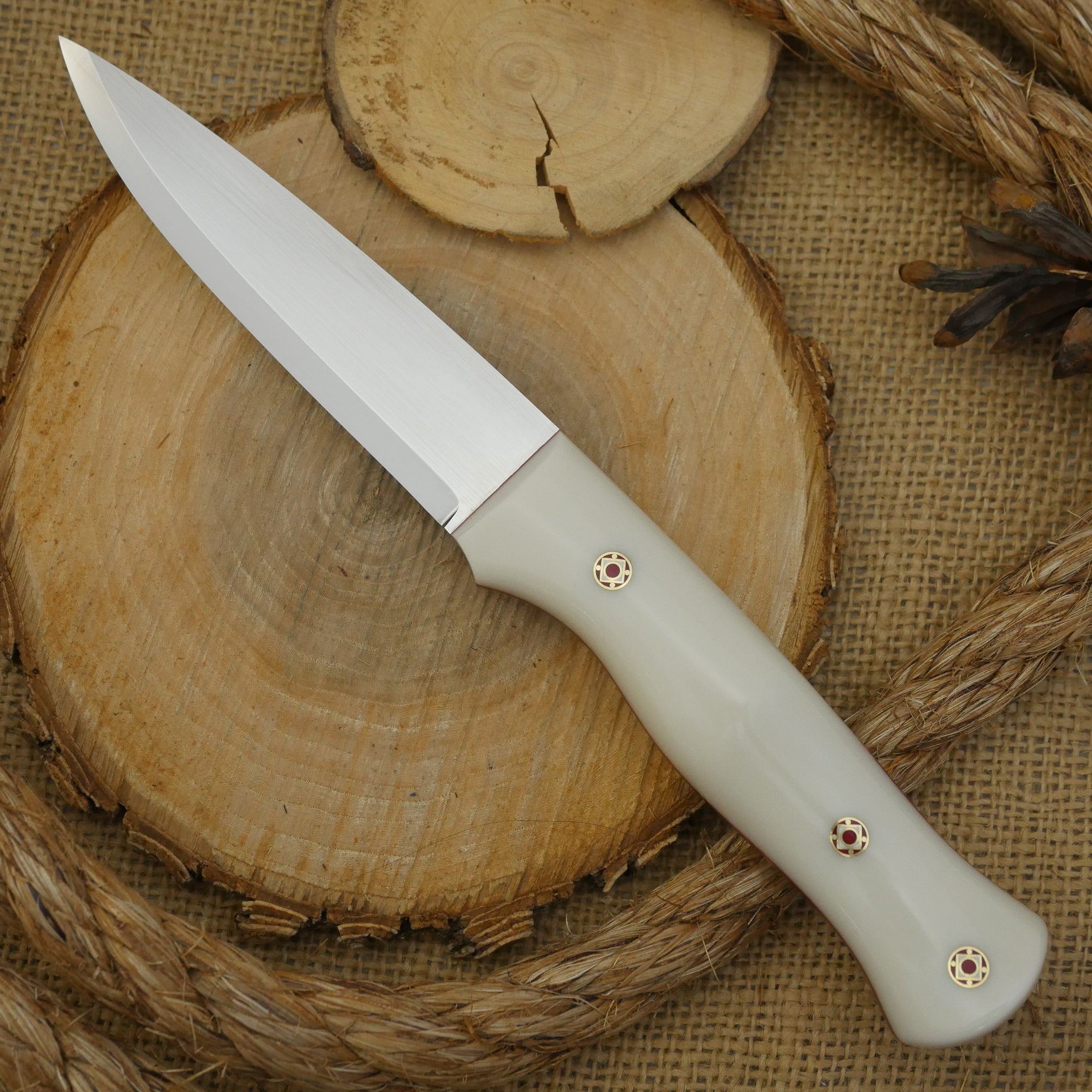 CPM 154 Mountaineer: Bone Corian, Cinnamon Liners & Mosaic Pins - Adventure Sworn Bushcraft Co.