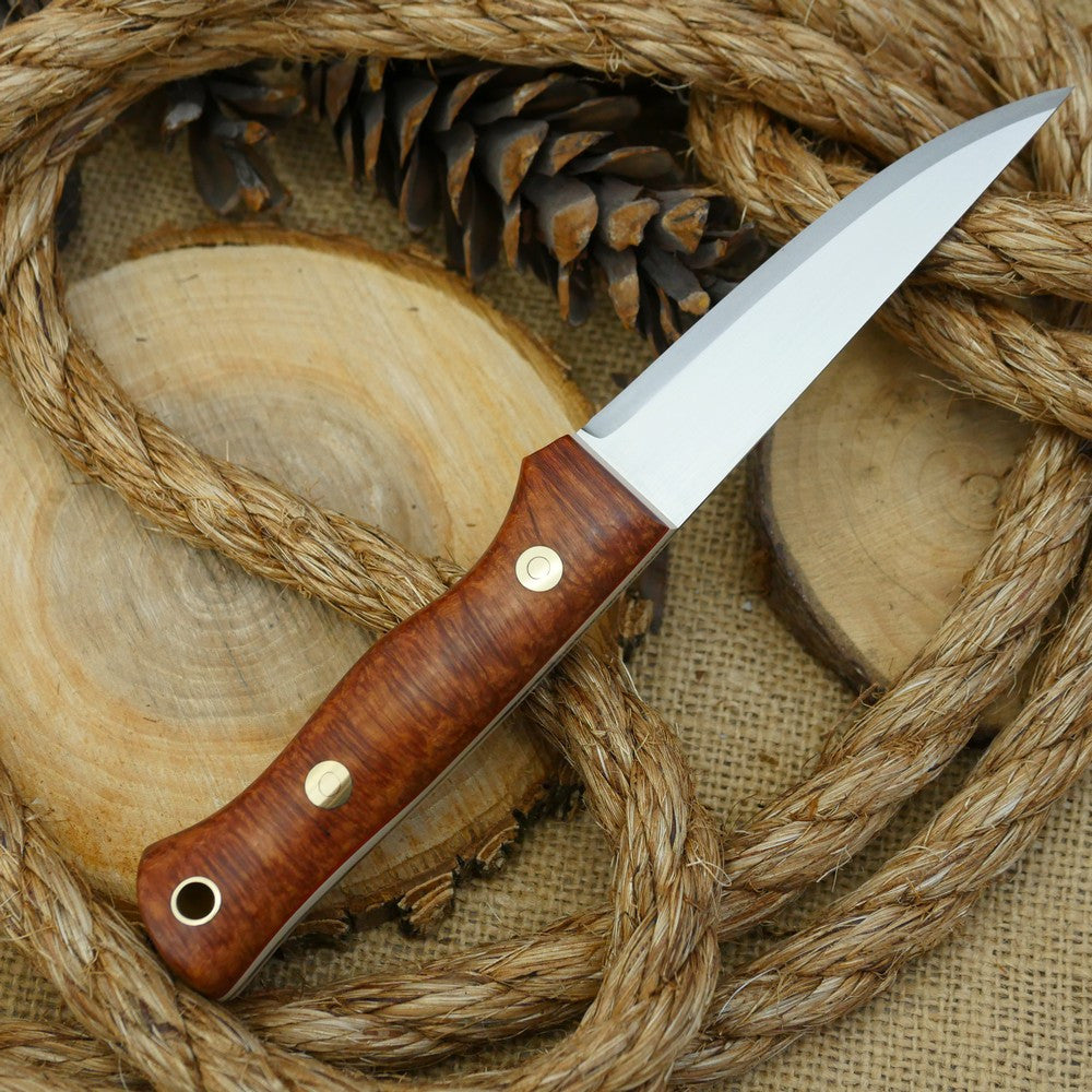 A Voyageur bushcraft knife with stabilized briar handle scales and ivory paper micarta liners