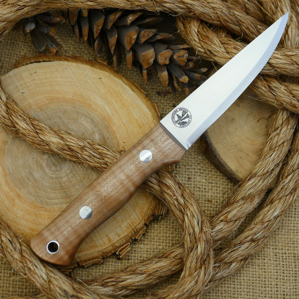 A Voyageur bushcraft knife with curly maple handle scales and double liners