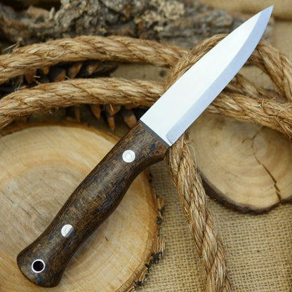 An Adventure Sworn Mountaineer with coffee bag burlap handle scales and thin blue liners